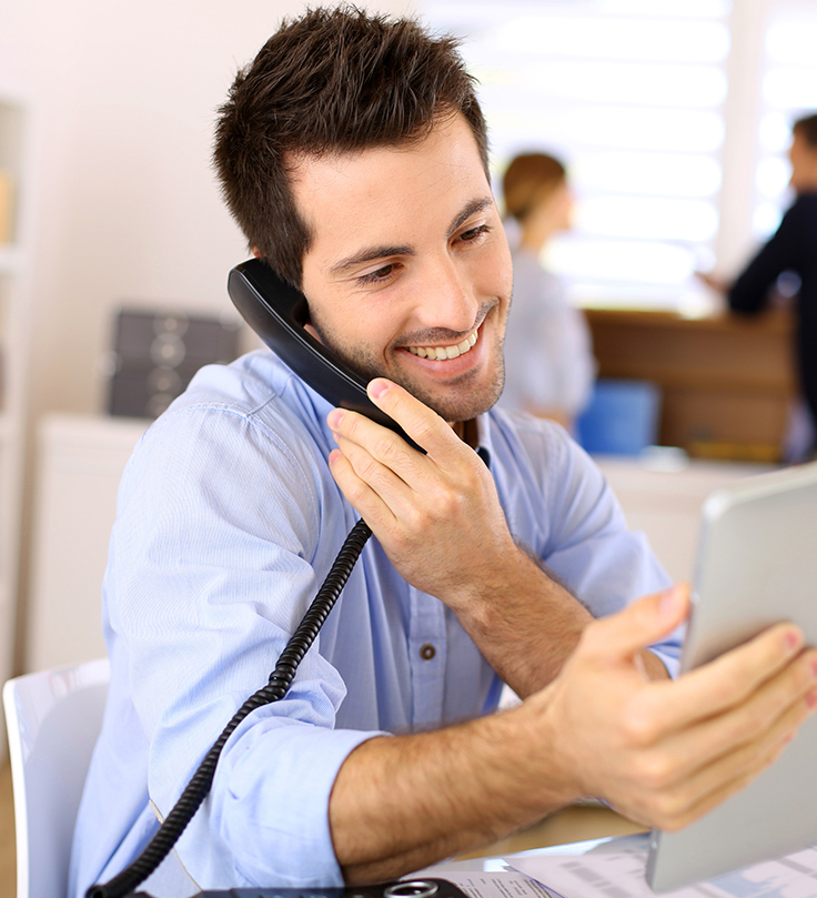 man on the phone in an office